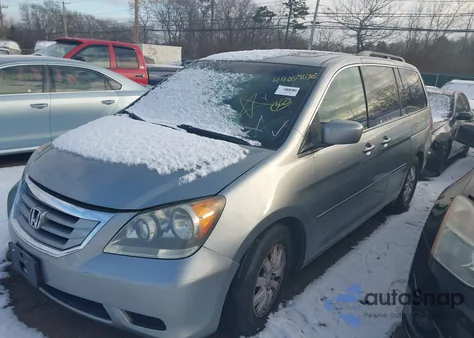 2010 Honda Odyssey Ex-L z USA, uszkodzony, nr VIN 5FNRL3H74AB098938